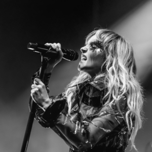 black and white image of lauren singing