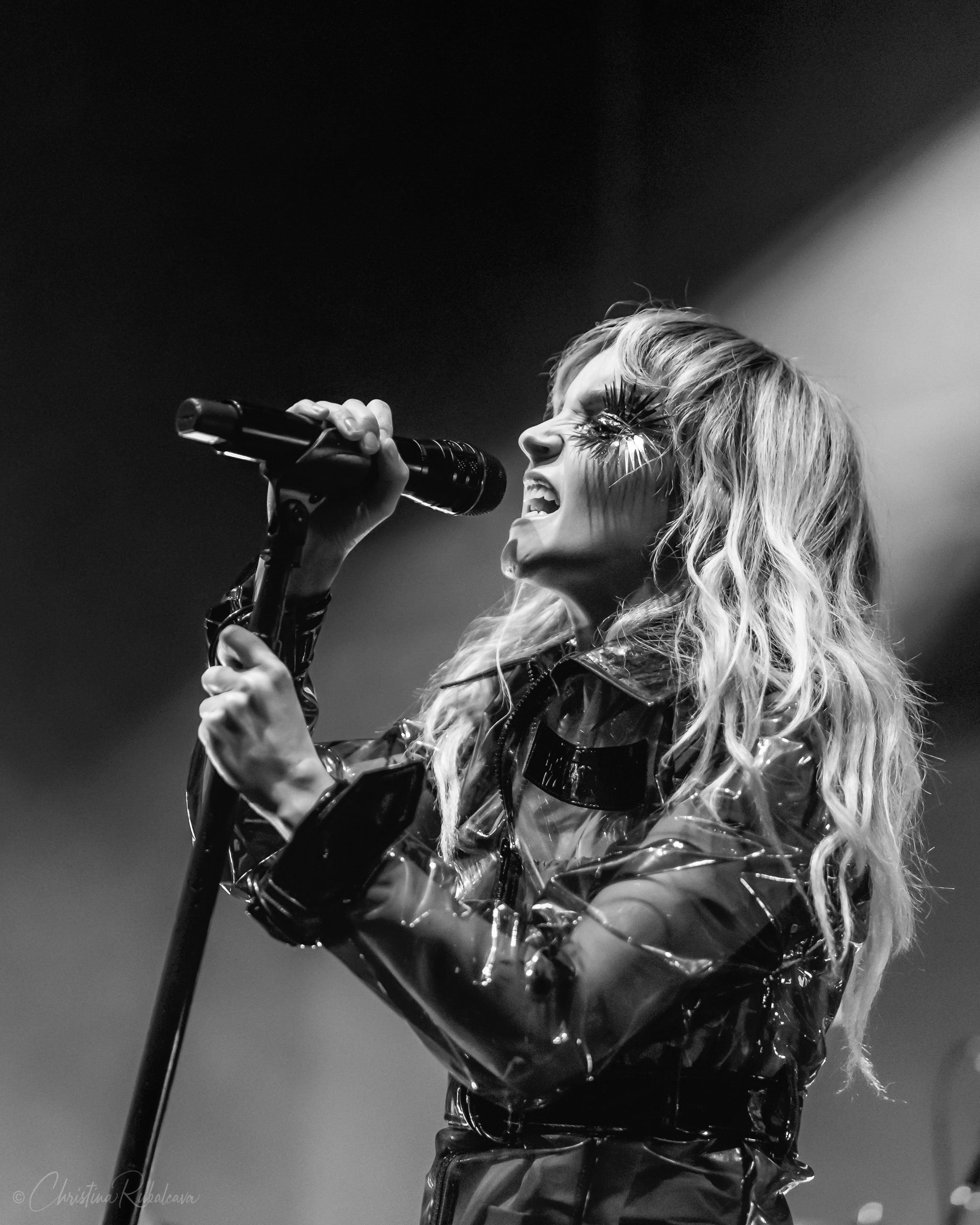 black and white image of lauren singing