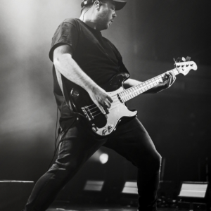 black and white image of Martin playing the bass guitar