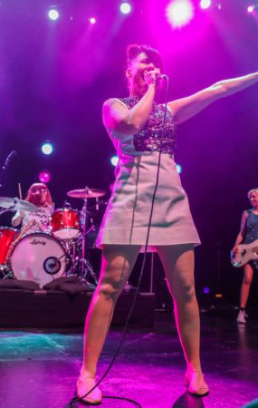 Kathleen Hanna of bikini kill on stage